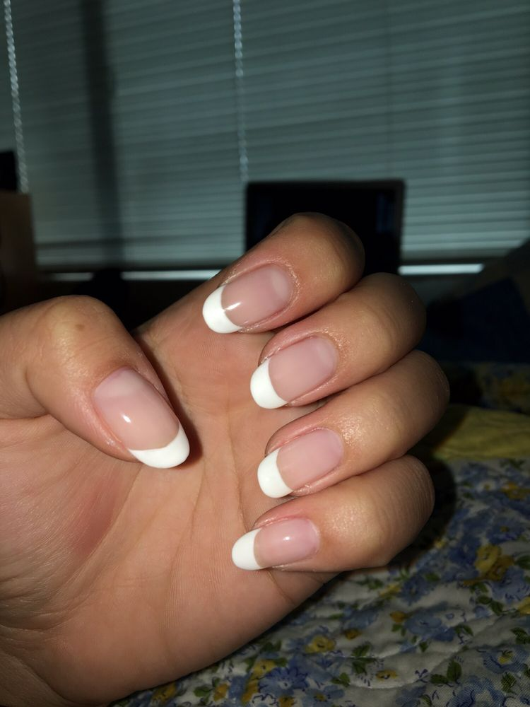 Classic white French tip manicure